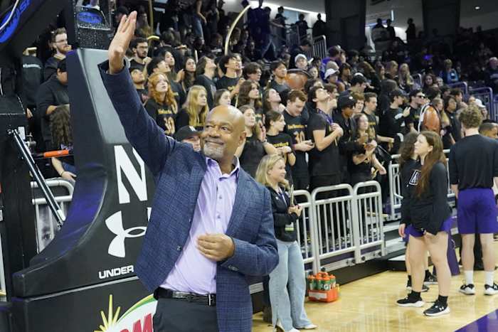 Former Northwestern Wildcats basketball player Billy McKinney is honored at halftime during a halftime ceremony. He is the first athlete to have his jersey retired at the school at Welsh-Ryan Arena.